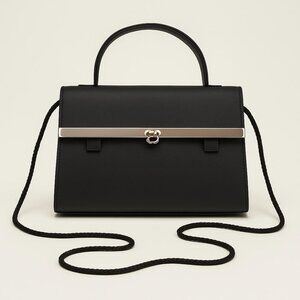 Vintage Black Structured Handbag with Silver-Tone Bar Accent & Strap